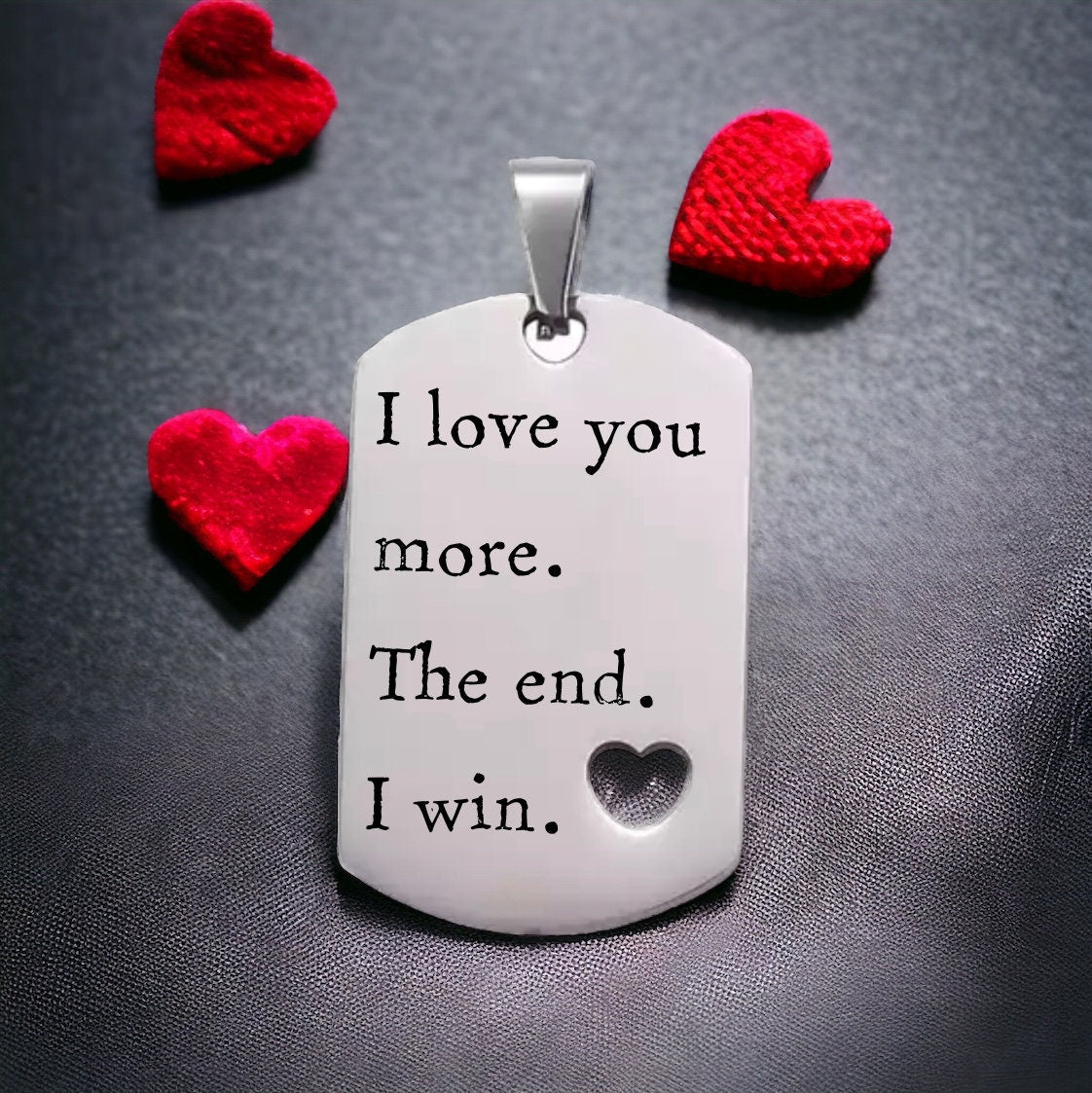 'I love you more. The end. I win.' Keyring