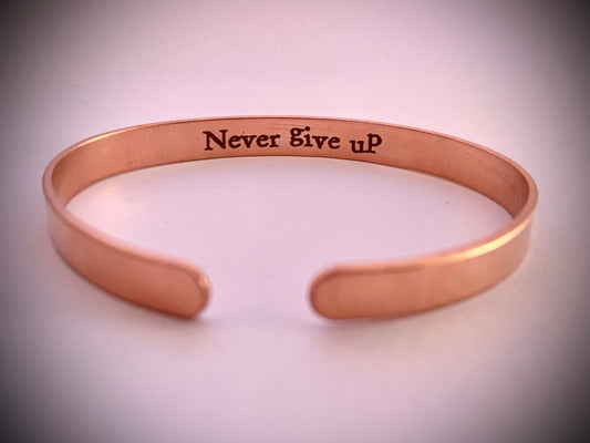 Never give up - think copper cuff bracelet with hidden motivational message